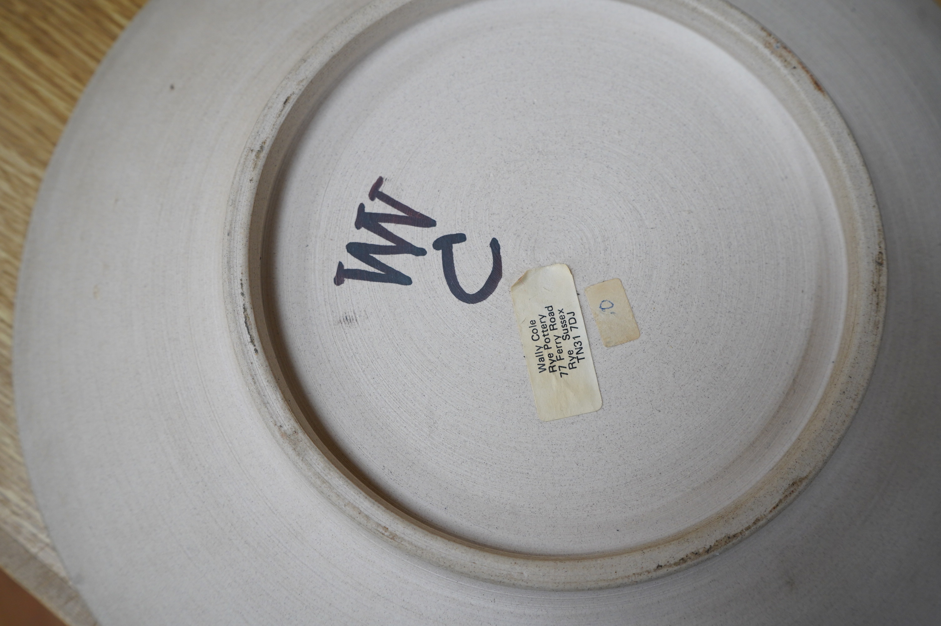 Wally Cole, a Rye pottery dish, signed to underside, 29cm diameter. From the Studio of Fred Cuming. Condition - good